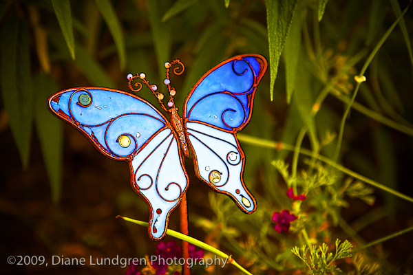 a bejeweled stained glass butterfly